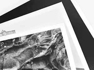 Three Fine Art Prints in black and white, with different textures and patterns, arranged one above the other.