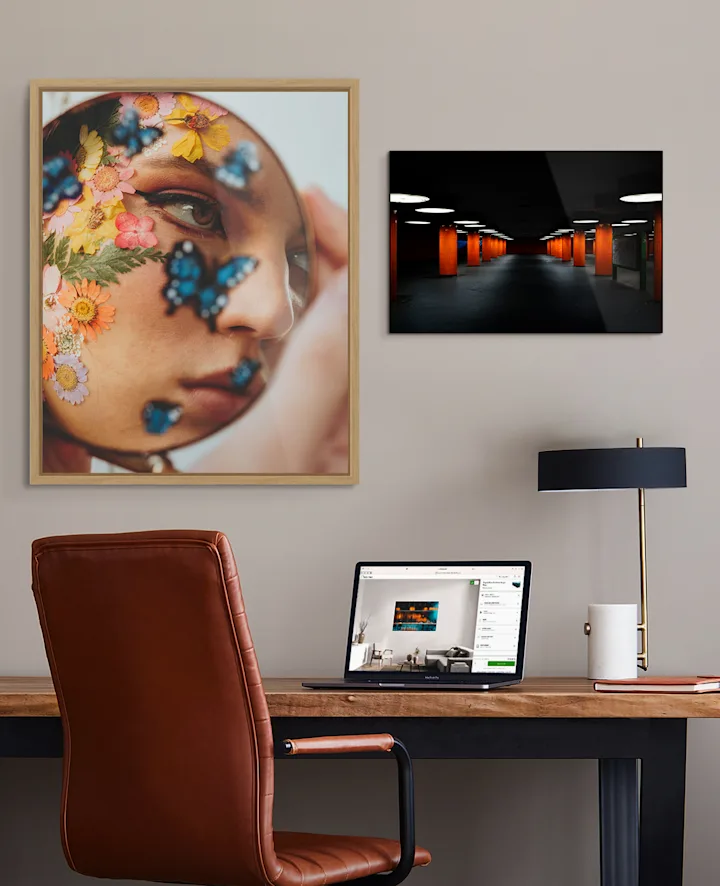 Newsletter subscription Office room with pictures on the wall and a laptop on a table.