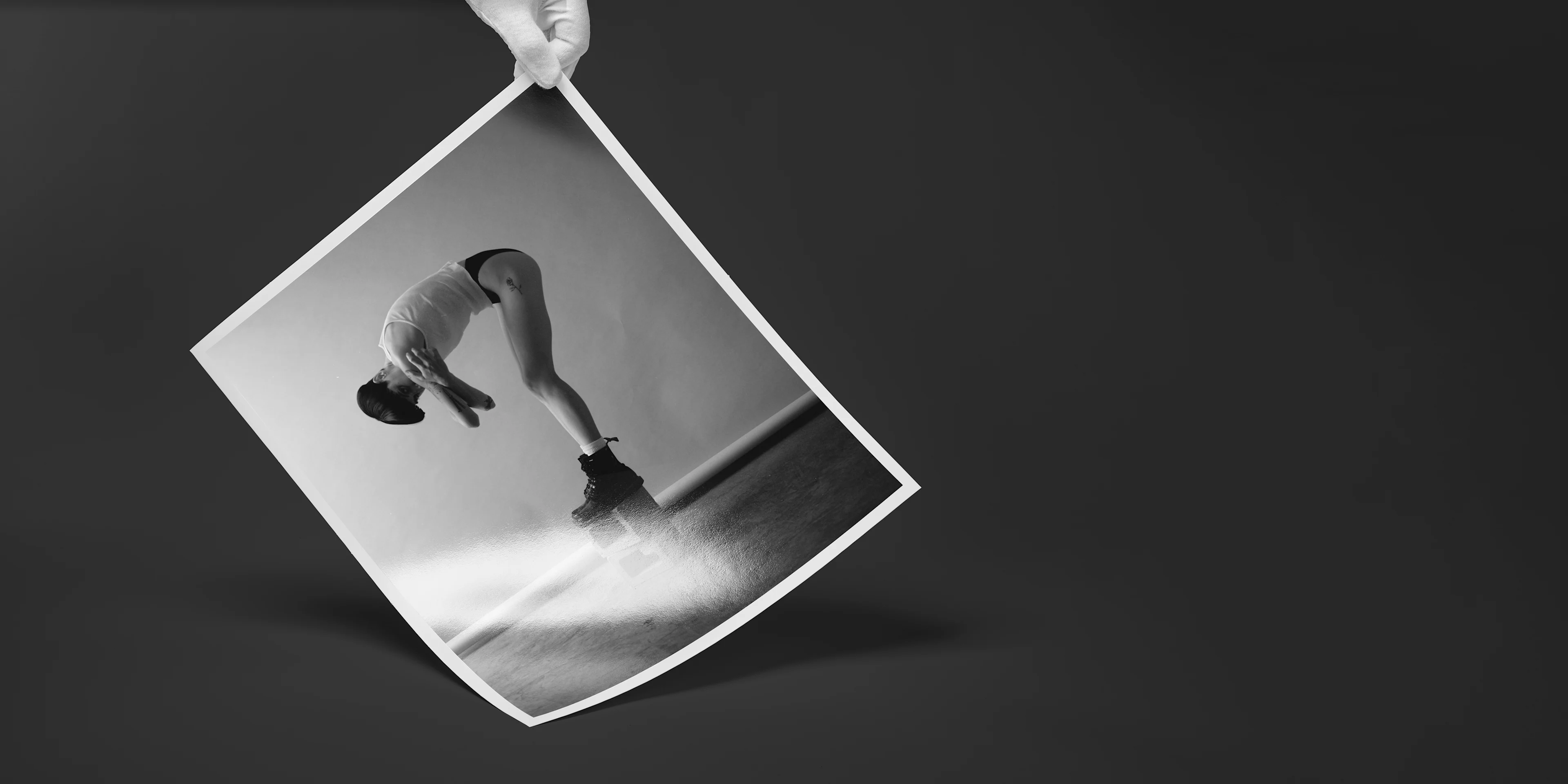 Fine art print held in the air to show the structure of the print.