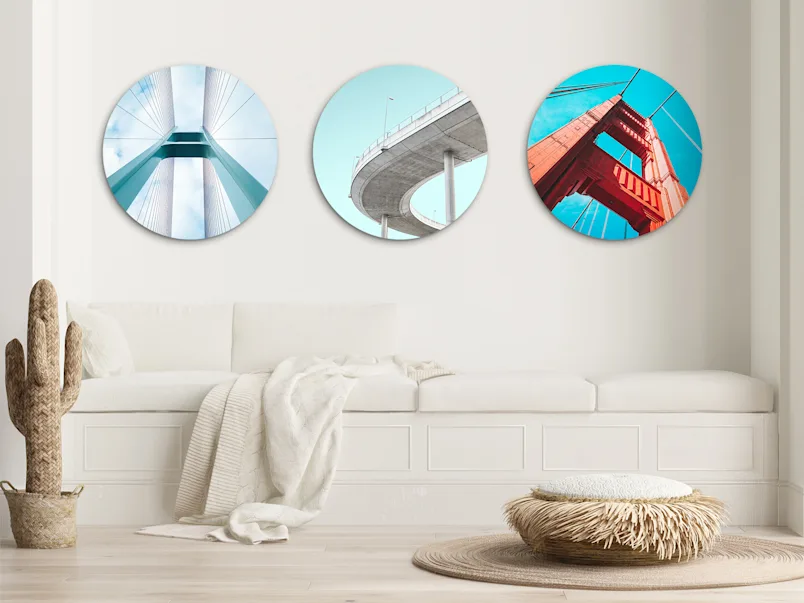 PDP | Round Format & Shapes | Product Selector Section | Media #4 Different motifs on 3 round Fomat of an Original Photo Print Under Acrylic Glass. hanging on a wall in a living room.