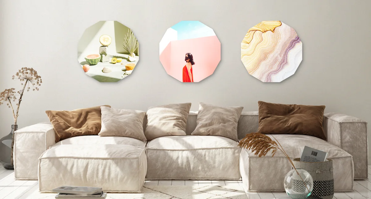 PDP | Round Format & Shapes | Big Picture Slider Section > Jewel | Slide #4 | Media #1 Two different motifs in the shape of a dodecagon hanging over a sofa.