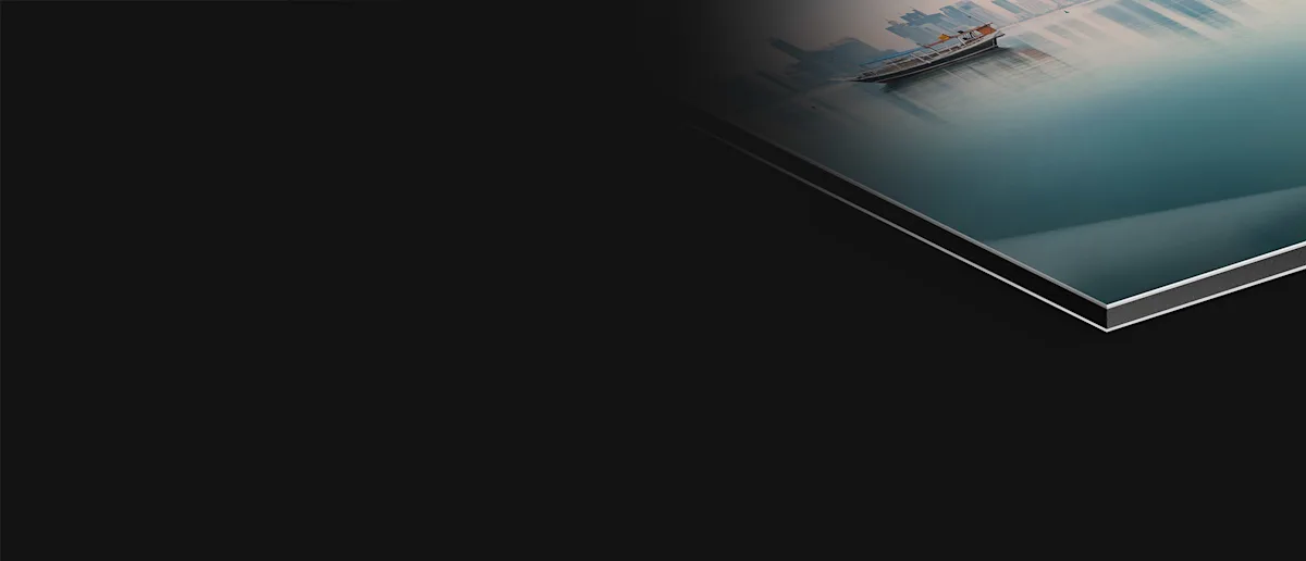 Photo Print On Aluminum Backing Corner of a photo print on aluminum Dibond, showing a smooth and reflective surface.