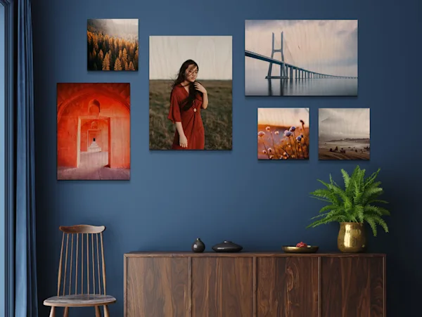 PDP | Direct Print on Wood | Images Text Section > Formats | Media #1 Several different motifs on Direct Print On Wood on a wall in a living room.