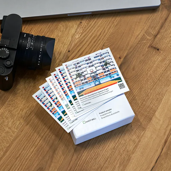 SEA | CDP | Wedding | Images Text Section | Samples | Image sample set lying on a table next to a camera.