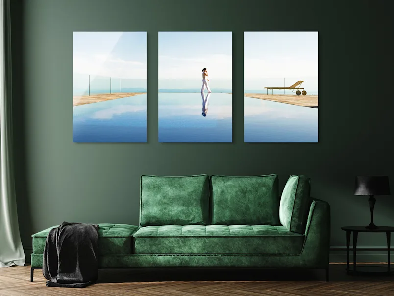 PDP | Multi Panel Wall Art | Product Selector Section | Media #1 A woman reflected in a swimming pool. The whole picture is divided into three parts.