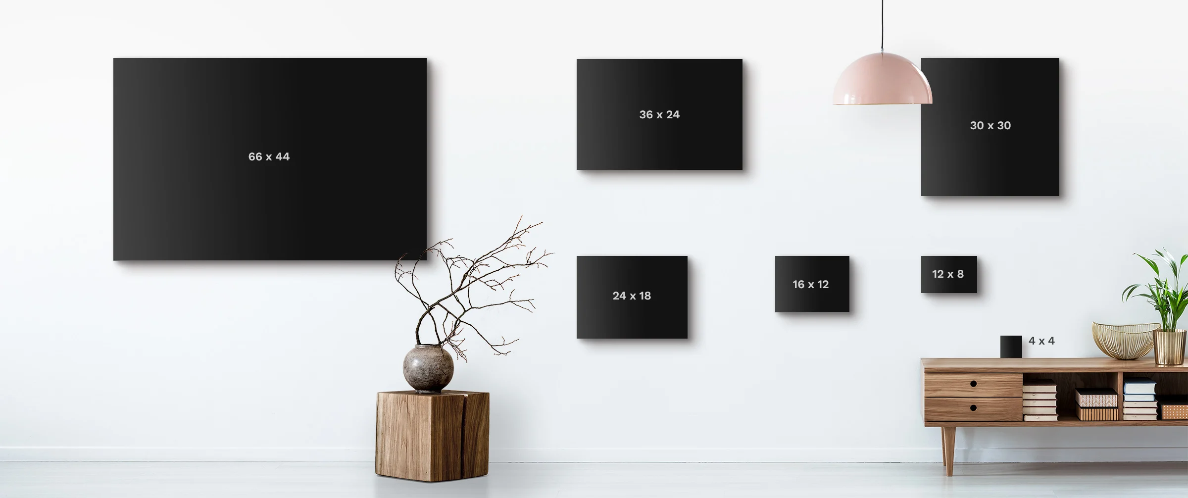 Size comparison graphic of several photo print formats on the wall.