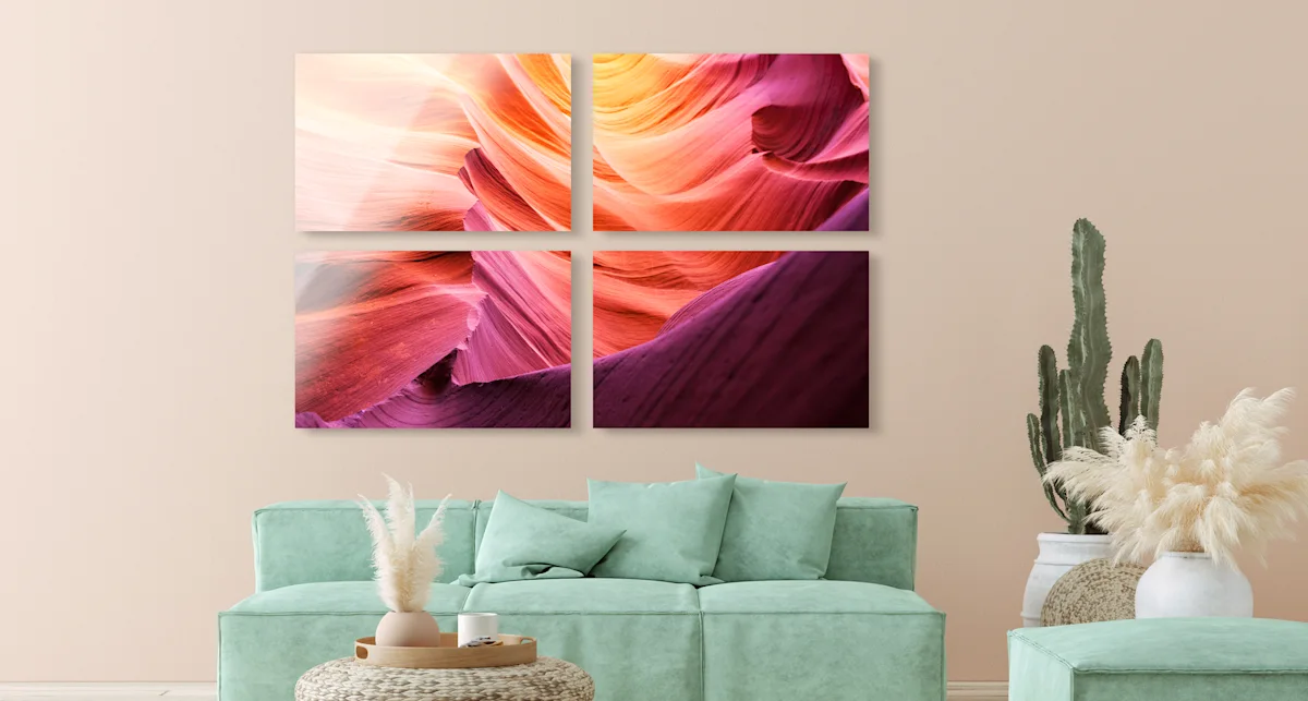 PDP | Multi Panel Wall Art | Big Picture Slider Section > Four-piece | Slide #3 | Media #1 A rocky landscape that appears in a range of colours from yellow to violet due to the incidence of light. The whole picture is divided into four parts.