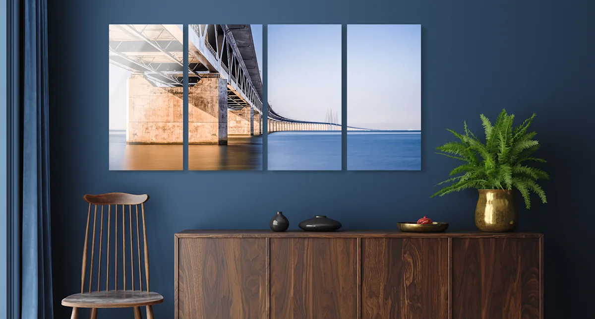 PDP | Multi Panel Wall Art | Big Picture Slider Section > Four-piece | Slide #4 | Media #1 A bridge running through the sea. The whole picture is divided into four parts that hang vertically on the wall.
