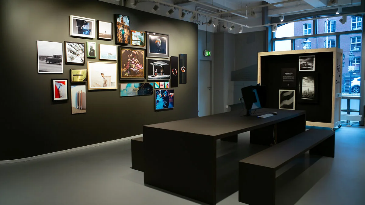 WhiteWall for business customers Store interior with whitewall print products on the wall.