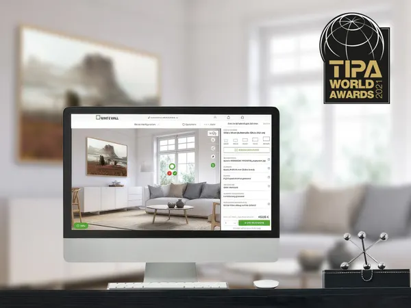 "Best Photo Lab" - TIPA 2021 with WhiteWall RoomView Computer screen displaying interior design software interface with a modern living room visualization and TIPA World Awards logo