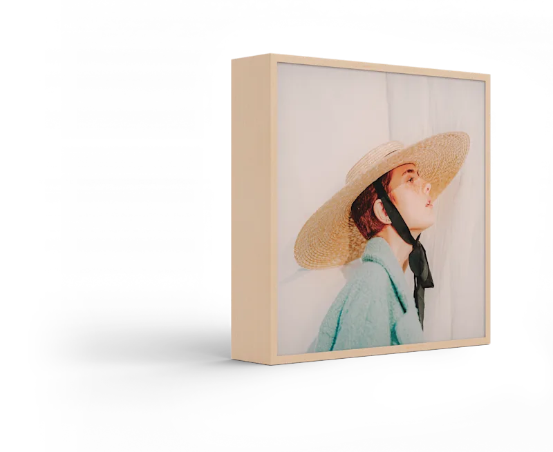 Standing ArtBox with frame color Natural maple against a white background.