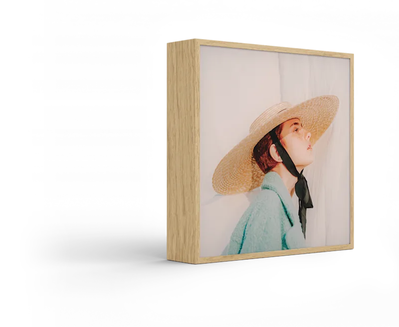 Standing ArtBox with frame color Natural oak against a white background.