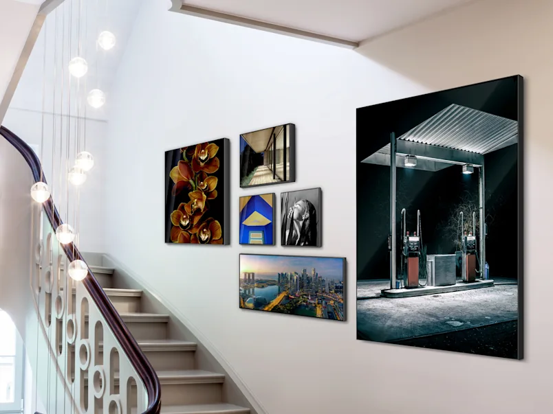 PDP | Aluminium ArtBox | Product Selector Section | Media #4 Several different motifs framed in an Aluminium ArtBox on a wall in a staircase.