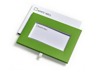 GLOBAL | Product Tiles Section > Gift Certificate | Media #1 whitewall gift certificate in a green envelope.