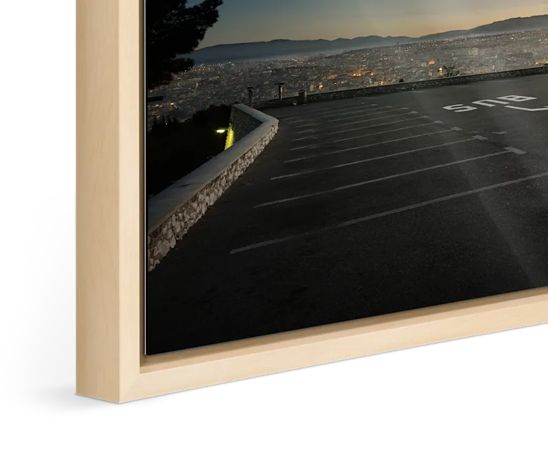 Close-up of the master print with Basel frame 15 mm in natural maple.