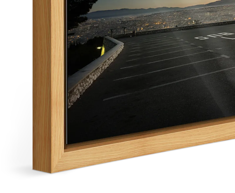 Close-up of the master print with Basel frame 31 mm in natural oak.